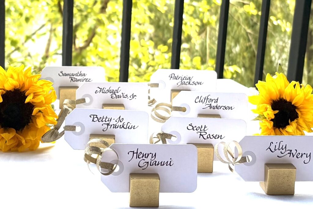 placecards with italic style in felt tip and sunflowers
